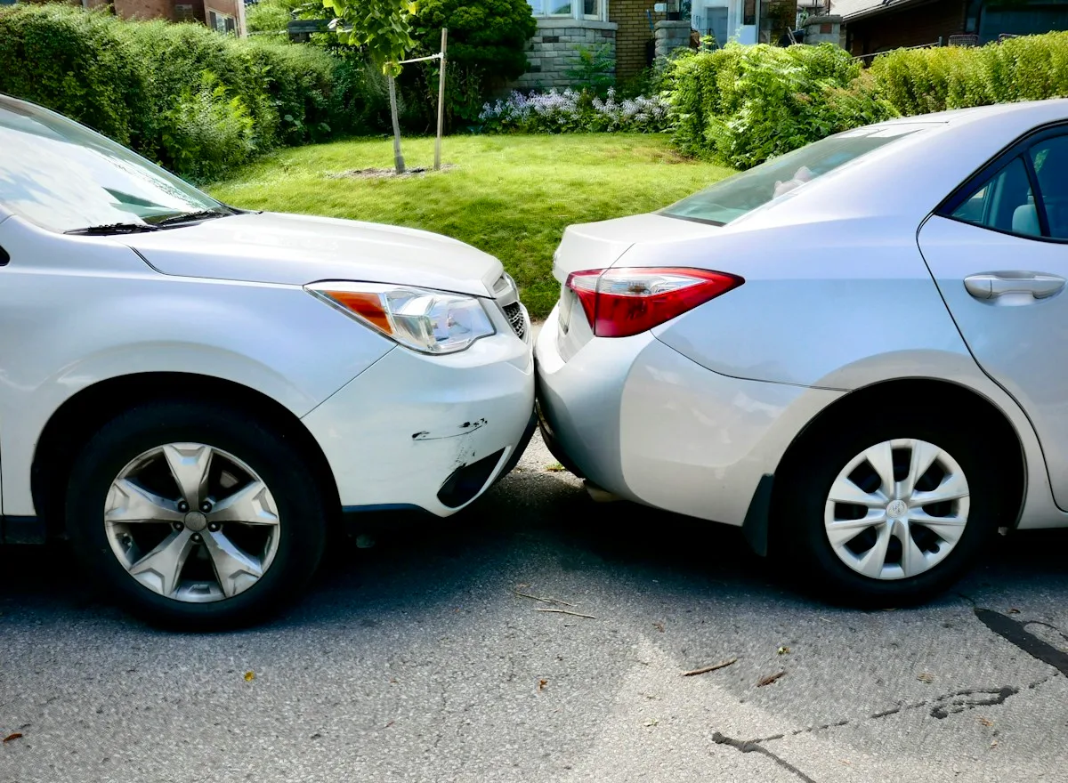 Two cars after a fender bender, car accident injury care in Meridian